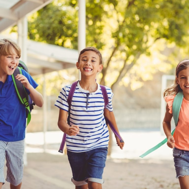Happy,School,Kids,Running,In,Corridor,At,School