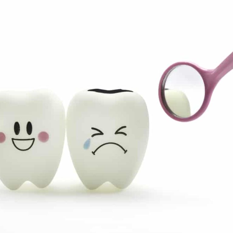 Tooth,Smile,And,Cry,Emotion,With,Dental,Mirror,On,White