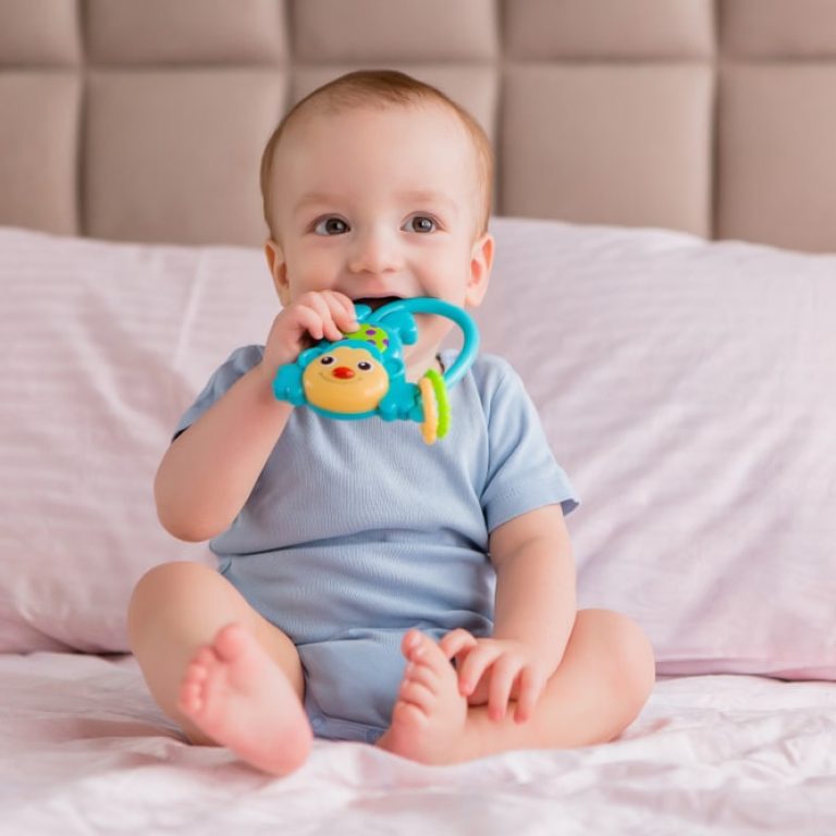 Cute,Baby,Boy,Sitting,And,Playing,With,Toys.,Adorable,Nine