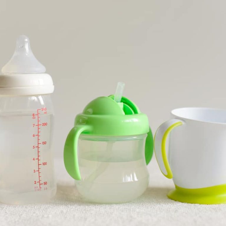 Three,Kinds,Of,Bottles,And,Cups,With,Water,For,Baby.