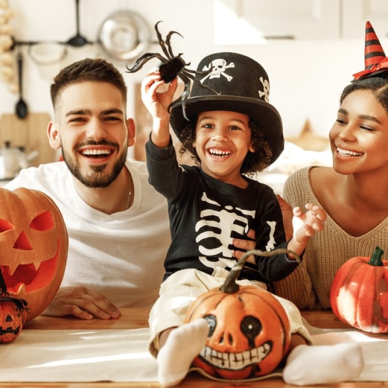 Cheerful,Multi,Ethnic,Family,Parents,With,Son,Smiling,While,Creating
