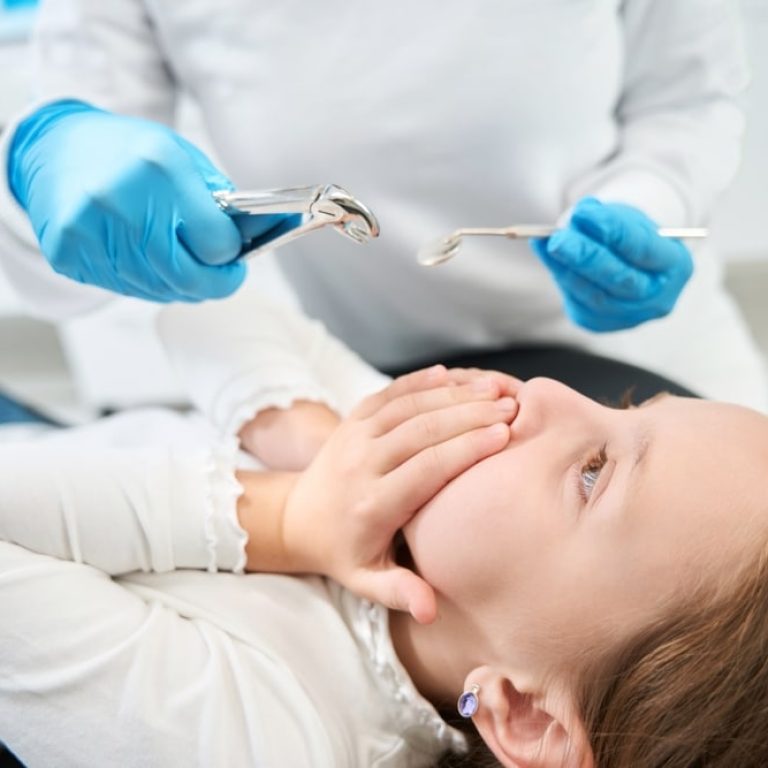 Capricious,Child,Refusing,To,Open,Her,Mouth,For,Tooth,Extraction