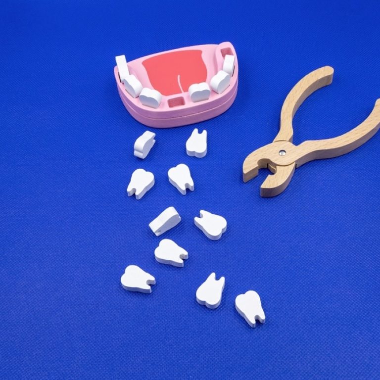 Toy,Teeth,On,A,Blue,Background.,Stomatologist,Toy,Set